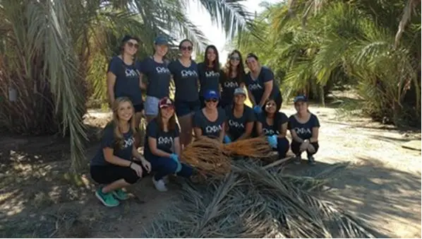 Omega Phi Alpha (National Service Sorority) at the ASU Date Palm grove on the Polytechnic campus